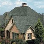 Residential home with a shingle roof
