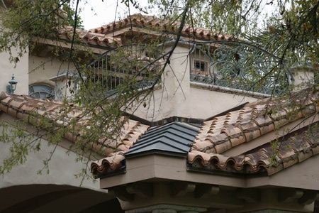 Residential home with a tile roof