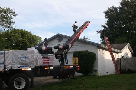 ANC roofers installing a shingle rooftop on a residential home