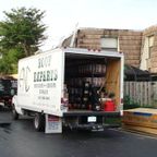 ANC Roofing box truck outside a residential home