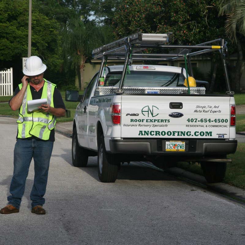 A man is standing on the road in Orlando, FL