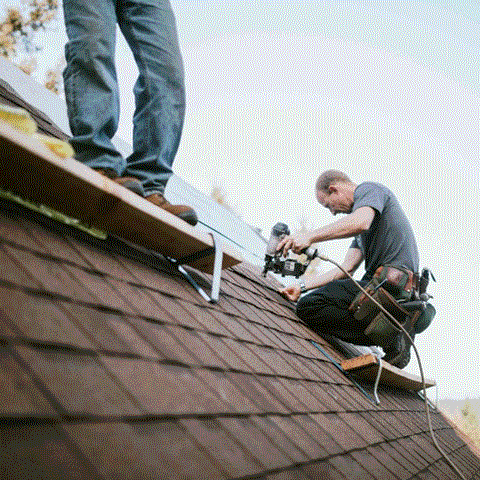 Man repairing a roof in Orlando, FL