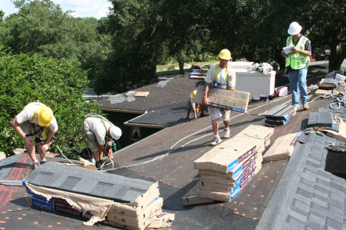 ANC Roofing’s shingle roofing trucks and service vehicles prepared for residential roof projects